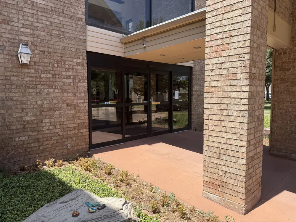 Storefront entrance with freshly cleaned glass doors